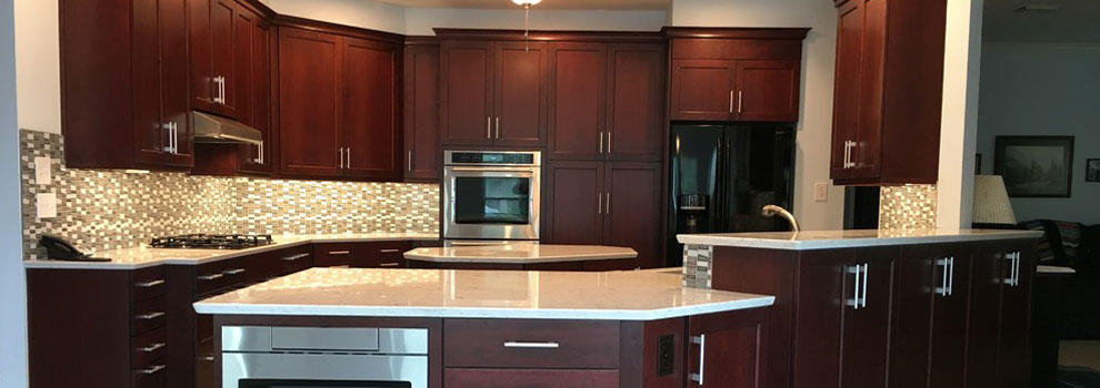 Bright Kitchen With Dark Cabinets And White Countertops Bay Area