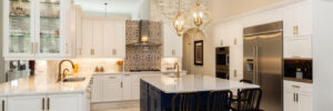 Beautiful luxury home kitchen with white cabinets.