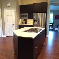 The island cooking area provides abundant storage via the many drawers and behind-doors storage all the way around. No wasted space- every inch is usable and fully accessible.