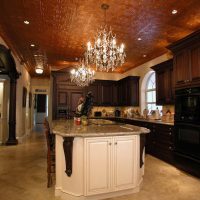 Kitchen Island and Cherry Cabinets
The glazed white island features dark cherry corbels to coordinate with the other kitchen cabinets. custom luxury kitchen