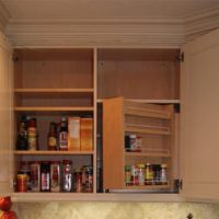 This ingenious fold-out cabinet houses spices & oils.