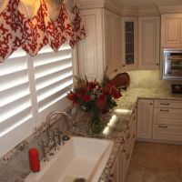Large single-bowl sink for washing pots & pans, with it's own dishwasher. Viking steam oven is seen above & right.