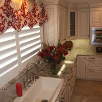 Large single-bowl sink for washing pots & pans, with it's own dishwasher. Viking steam oven is seen above & right.