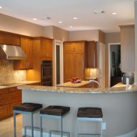 Clean, sleek lines, warm tones and functionality were the goals for this kitchen remodel. Great lighting was also key, so we used all highly efficient LED lighting throughout the space, including in the recessed cans, indirect and under-cabinet lighting, as well as cabinet interior lighting as shown in an upcoming photo.