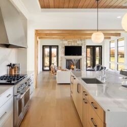 Open concept living room & kitchen with Cambria countertops.