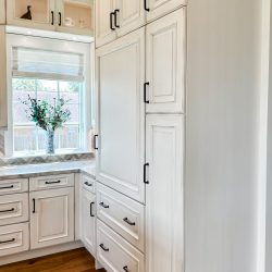 Custom white kitchen cabinetry by Bay Area Kitchens.